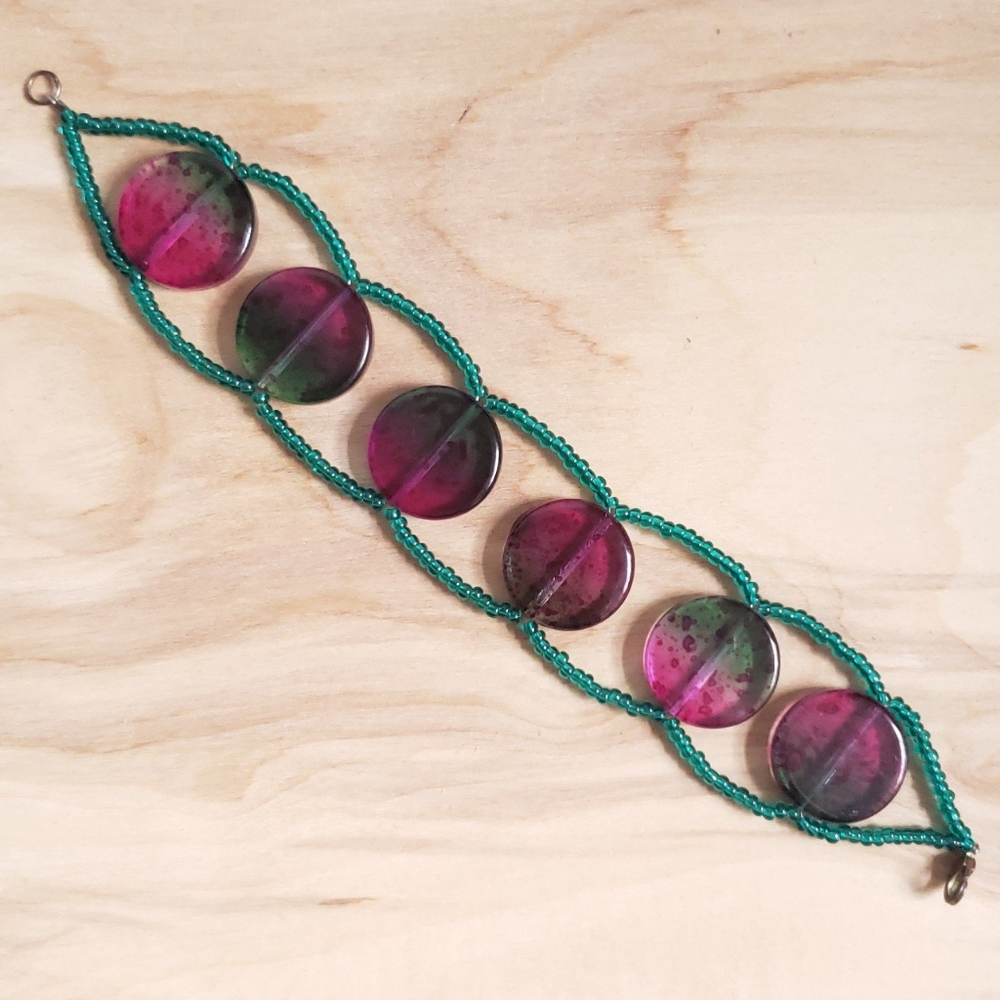 Handmade magenta and teal beaded bracelet